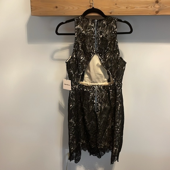 Lacey open back black dress - Picture 3 of 3